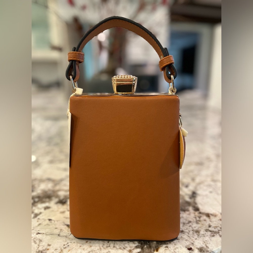 Vegan leather pocketbook w shoulder strap, crystal knob,  8x6 at widest.